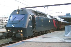 DSB ME 1525 photographed in Fredericia 17. April 2005.  The ME class was built by Henchel in Germany in a number of 37. It was put in service in 1981 - 1985. CO-CO. GM diesel engine 16. cyl. 3.300 hp. Max speed 175 km/h - 109 mph. Length 21 000 mm. Weight 115 metric tonnes. ME 1525 was put in service in 1983.