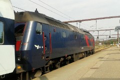 DSB ME 1509 photographed in Fredericia 24. August 2015.  The ME class was built by Henchel in Germany in a number of 37. It was put in service in 1981 - 1985. CO-CO. GM diesel engine 16. cyl. 3.300 hp. Max speed 175 km/h - 109 mph. Length 21 000 mm. Weight 115 metric tonnes. ME 1509 was put in service in 1981.
