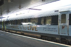Ic3 trainset MFA 5003/MFB 5203 (named H. C. Andersen) photographed at the railwaystation i Fredericia 10. September 2005.  The Ic3 was built by ABB Scandia in Denmark. Each unit consists of 3 coaches. Built in a number of 92 trainsets. The trainsets were put in service in 1989 - 1998. 4 diesel engines of 294 kW per trainset. Max speed 180 km/h - 112 mph. Length 58 800 mm. Weight 97 metric tonnes. 16 seats 1st class, 128 seats 2nd class. Up to 5 trainsets can be put together. The MFA 5003/MFB 5203 was put in service in 1989.