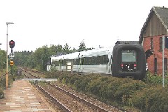 Ic3 trainset MFA 5083/MFB 5283 (named Max Brauer) photographed in Skørping 18. September 2005.  The Ic3 was built by ABB Scandia in Denmark. Each unit consists of 3 coaches. Built in a number of 92 trainsets. The trainsets were put in service in 1989 - 1998. 4 diesel engines of 294 kW per trainset. Max speed 180 km/h - 112 mph. Length 58 800 mm. Weight 97 metric tonnes. 16 seats 1st class, 128 seats 2nd class. Up to 5 trainsets can be put together. The MFA 5083/MFB 5283 was put in service in 1993.