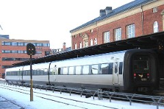 Ic3 trainset MFA 5036/MFB 5236 (named Top-Karen) photographed at the railwaystation in Aalborg 28. January 2006.  The Ic3 was built by ABB Scandia in Denmark. Each unit consists of 3 coaches. Built in a number of 92 trainsets. The trainsets were put in service in 1989 - 1998. 4 diesel engines of 294 kW per trainset. Max speed 180 km/h - 112 mph. Length 58 800 mm. Weight 97 metric tonnes. 16 seats 1st class, 128 seats 2nd class. Up to 5 trainsets can be put together. The MFA 5036/MFB 5236 was put in service in 1991.