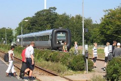 Ic3 trainset MFA 5030/MFB 5230 (named Kong Frederik IX) photographed in Vildbjerg 13. September 2006.  The Ic3 was built by ABB Scandia in Denmark. Each unit consists of 3 coaches. Built in a number of 92 trainsets. The trainsets were put in service in 1989 - 1998. 4 diesel engines of 294 kW per trainset. Max speed 180 km/h - 112 mph. Length 58 800 mm. Weight 97 metric tonnes. 16 seats 1st class, 128 seats 2nd class. Up to 5 trainsets can be put together. The MFA 5030/MFB 5230 was put in service in 1991.