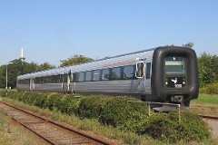 Ic3 trainset MFA 5030/MFB 5230 (named Kong Frederik IX) photographed in Vildbjerg 13. September 2006.  The Ic3 was built by ABB Scandia in Denmark. Each unit consists of 3 coaches. Built in a number of 92 trainsets. The trainsets were put in service in 1989 - 1998. 4 diesel engines of 294 kW per trainset. Max speed 180 km/h - 112 mph. Length 58 800 mm. Weight 97 metric tonnes. 16 seats 1st class, 128 seats 2nd class. Up to 5 trainsets can be put together. The MFA 5030/MFB 5230 was put in service in 1991.