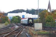 Ic3 trainset MFA 5038/MFB 5238 (named Christen Kold) photographed in Vejle 22. October 2006.  The Ic3 was built by ABB Scandia in Denmark. Each unit consists of 3 coaches. Built in a number of 92 trainsets. The trainsets were put in service in 1989 - 1998. 4 diesel engines of 294 kW per trainset. Max speed 180 km/h - 112 mph. Length 58 800 mm. Weight 97 metric tonnes. 16 seats 1st class, 128 seats 2nd class. Up to 5 trainsets can be put together. The MFA 5038/MFB 5238 was put in service in 1991.