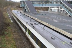 Ic3 trainset MFA 5003/MFB 5203 (named H. C. Andersen) photographed in Skive 21. January 2007.  The Ic3 was built by ABB Scandia in Denmark. Each unit consists of 3 coaches. Built in a number of 92 trainsets. The trainsets were put in service in 1989 - 1998. 4 diesel engines of 294 kW per trainset. Max speed 180 km/h - 112 mph. Length 58 800 mm. Weight 97 metric tonnes. 16 seats 1st class, 128 seats 2nd class. Up to 5 trainsets can be put together. The MFA 5003/MFB 5203 was put in service in 1989.