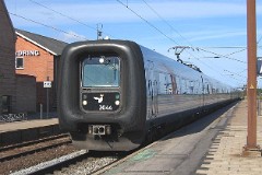 DSB IR4 ER2044 trainset photographed in Slagelse 4. August 2007.  The IR4 was built by ABB Scandia in Denmark. Each unit consists of 3 coaches. Built in a number of 44 trainsets. The trainsets were put in service in 1989 - 1998. 4 electric engines of 420 kW per trainset. Max speed 180 km/h - 112 mph. Length 76 530 mm. Weight 133 metric tonnes. 24/16 seats 1st class, 183/183 + 20 seats 2nd class. Up to 5 trainsets can be put together. IR4 2044 was put in service in 1997.