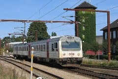 DSB MR 4062/MRD 4262 photographed at the railwaystation in Fredericia 10. September 2005.  The MR class was purchased from 1981 to 1985 in a number of 97. The MR class was purchased from 1978 to 1985 in a number of 98. The first 30 of the MR class were built by Uerdingen in Germany, the rest of the MR class and all of the MRD class were built by Scandia in Denmark. Dieselhydraulic Deutz engine. 325 hp. Max speed 120 km/h - 75 mph. Length each unit 22 335 mm. Weight 34,5 metric tonnes. One trainset consists of two units. Renovated in 1995 - 1997. Increased max. speed to 130 km/h - 81 mph. MR 4062 was put in service in 1979 - MRD 4262 was put in service in 1983. This trainset was in the period from 2003 to 2005 leased by Arriva.