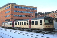 DSB MR 4065/MRD 4265 photographed at the railway station in Aalborg 28. January 2006.  The MR class was purchased from 1981 to 1985 in a number of 97. The MR class was purchased from 1978 to 1985 in a number of 98. The first 30 of the MR class were built by Uerdingen in Germany, the rest of the MR class and all of the MRD class were built by Scandia in Denmark. Dieselhydraulic Deutz engine. 325 hp. Max speed 120 km/h - 75 mph. Length each unit 22 335 mm. Weight 34,5 metric tonnes. One trainset consists of two units. Renovated in 1995 - 1997. Increased max. speed to 130 km/h - 81 mph. MR 4065 was put in service in 1984 - MRD 4265 was put in service in 1983.
