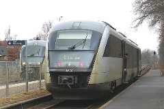 DSB Desiro MQ 4114 and MQ 4113 trainsets photographed in Fruens Bøge by Odense 17. March 2006. The MQ class is built by Siemens in Germany. DSB has leased 12 units primarily for the line Odense - Svendborg. The type is used widely in Germany. The trainsets were put in service in Denmark in 2002. Two diesel engines of 315 kW per trainset. Max speed 120 km/h - 75 mph. Length 41 700 mm. Weight 68,2 metric tonnes. 114 seats 2nd class. Up to 3 trainsets can be put together.