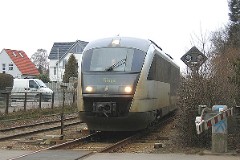 DSB Desiro MQ 4119/4919 trainset photographed in Fruens Bøge by Odense 17. March 2006.The MQ class is built by Siemens in Germany. DSB has leased 12 units primarily for the line Odense - Svendborg. The type is used widely in Germany. The trainsets were put in service in Denmark in 2002. Two diesel engines of 315 kW per trainset. Max speed 120 km/h - 75 mph. Length 41 700 mm. Weight 68,2 metric tonnes. 114 seats 2nd class. Up to 3 trainsets can be put together.