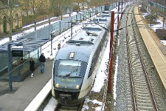 DSB Desiro MQ 4121 trainset photographed in Tommerup 17. March 2006 .The MQ class is built by Siemens in Germany. DSB has leased 12 units primarily for the line Odense - Svendborg. The type is used widely in Germany. The trainsets were put in service in Denmark in 2002. Two diesel engines of 315 kW per trainset. Max speed 120 km/h - 75 mph. Length 41 700 mm. Weight 68,2 metric tonnes. 114 seats 2nd class. Up to 3 trainsets can be put together.