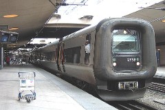 The "Øresundstog" trainset photographed in Kastrup Airport 15. May 2006. . The trainset is built by Adtranz, Sweden (Bombardier Transportation). It is purchased in corporation between SJ, Sweden and DSB, Denmark. The trainsets are in operation between Sjælland in Denmark and southern Sweden via the bridge over Øresund. Each unit consists of 3 coaches. The trainsets was put in service in 2000 - 2003. Electric. 2.120 kW. Max speed 180 km/h - 112 mph. Length 78 900 mm. Weight 153 metric tonnes. 20 seats 1st class, 217 seats 2nd class. Up to 5 trainsets can be put together.