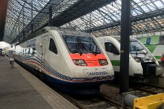 Allegro trainset class Sm6, Helsinki Central Station, 30. June 2016. The Allegro trainsets are in service between Helsinki and St. Petersburg in Russia. The trainsets are built by Alstom, having a maximum speed at 220 km/h. They are owned by Karelian Trains, a joint venture between Russian Railways (RZhD) and VR Group ((Suomen Valtion Rautatiet/Finnish Railways)