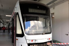 Stadler Variobahn, photographed at the work shop of Midttrafik in Aarhus, 8. October 2016.  This type will be delivered in a number of 14 . It has a maximum speed of 80 km/h. The new tram line is supposed to be ready for operation in 2017. The tram line transforms two existing railways - Odderbanen and the Grenaa railway - to an electric light rail. The two lines will be connected via a new track from Lystrup, Skejby, Randersvej, the urban harbor and Aarhus Central Station.