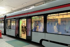 Stadler Tango, photographed at the work shop of Midttrafik in Aarhus, 8. October 2016.  This type will be delivered in a number of 12 . It has a maximum speed of 100 km/h. The new tram line is supposed to be ready for operation in 2017. The tram line transforms two existing railways - Odderbanen and the Grenaa railway - to an electric light rail. The two lines will be connected via a new track from Lystrup, Skejby, Randersvej, the urban harbor and Aarhus Central Station.
